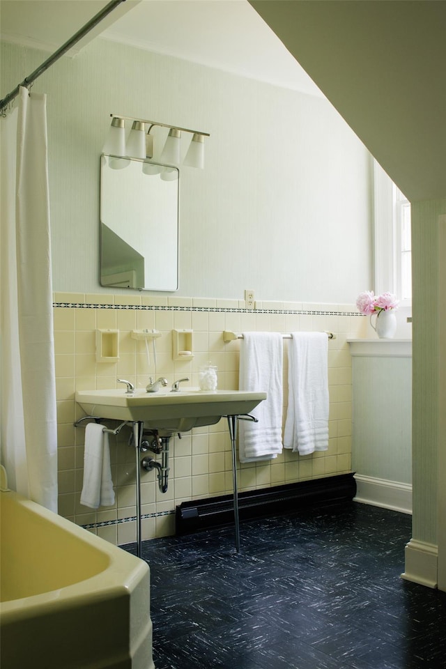 33 Scott Rd, Hudson, NY 12534 - bathroom featuring tile walls, a shower with curtain, and wainscoting