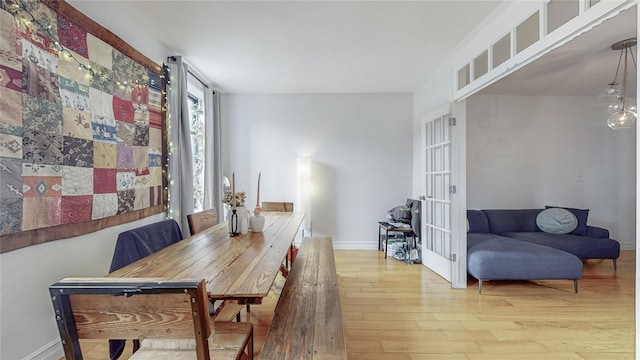 450 W 152nd St Unit 52, New York Manhattan, NY 10031 - dining room with wood-type flooring and french doors