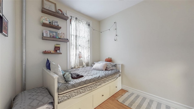 450 W 152nd St Unit 52, New York Manhattan, NY 10031 - bedroom featuring light wood-style floors and baseboards