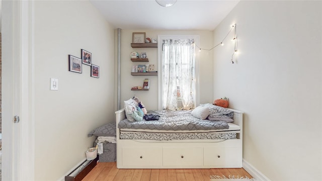 450 W 152nd St Unit 52, New York Manhattan, NY 10031 - bedroom featuring light wood-style floors and baseboards