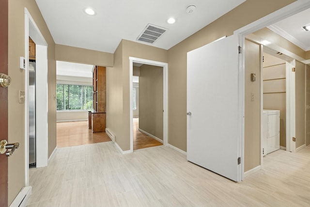 206 Heritage Unit A, Somers, NY 10589 - hallway with a baseboard radiator, washer / dryer, and recessed lighting