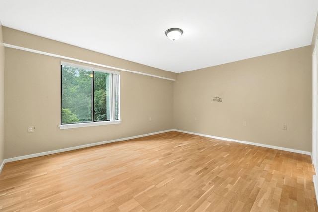 206 Heritage Unit A, Somers, NY 10589 - spare room with baseboards and light wood-style floors