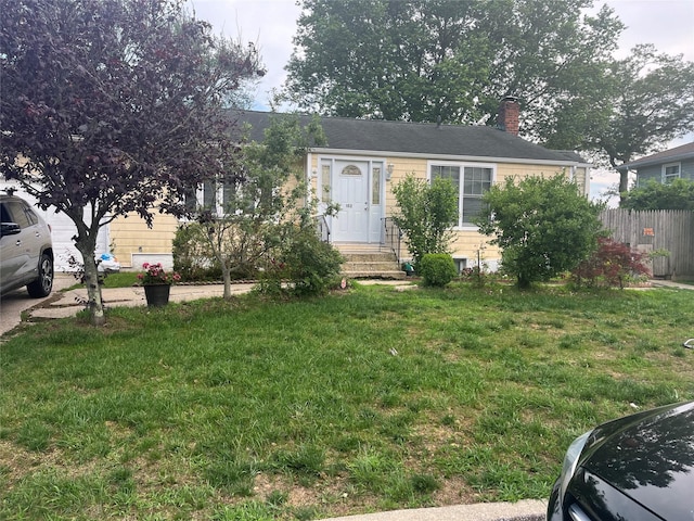 152 New Jersey Ave, Bay Shore, NY 11706 - view of front facade with a chimney