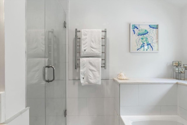 82 Wood Hollow Ln, New Rochelle, NY 10804 - bathroom featuring a shower stall, a towel warmer, and a bath