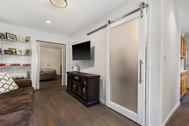 82 Wood Hollow Ln, New Rochelle, NY 10804 - living area featuring a barn door, wood finished floors, and recessed lighting