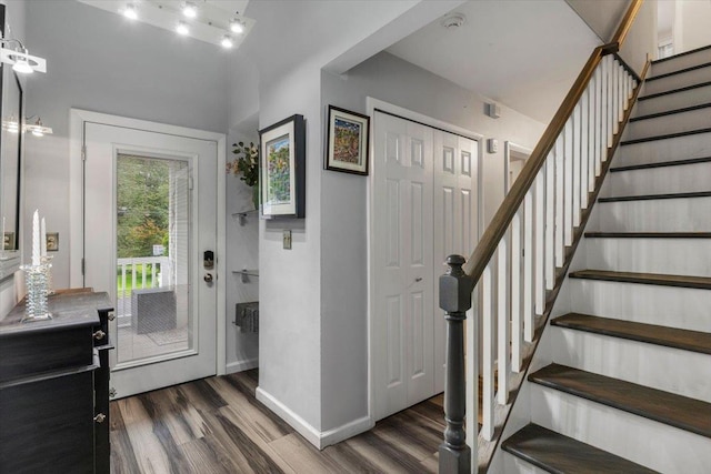 82 Wood Hollow Ln, New Rochelle, NY 10804 - foyer entrance with wood finished floors and stairway