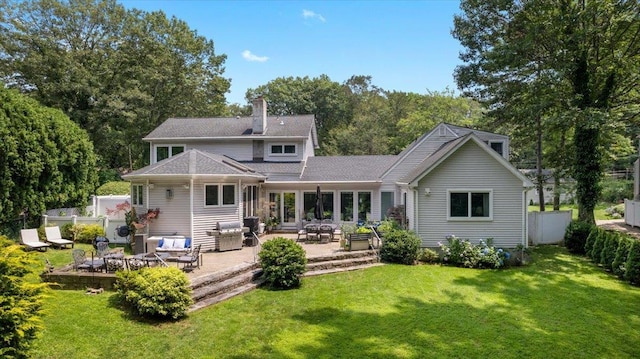 82 Wood Hollow Ln, New Rochelle, NY 10804 - rear view of property featuring a chimney and a patio