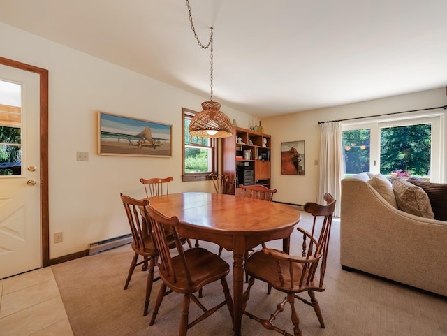 75 Hartung Rd, Eldred, NY 12743 - dining space featuring a baseboard heating unit and light tile patterned floors