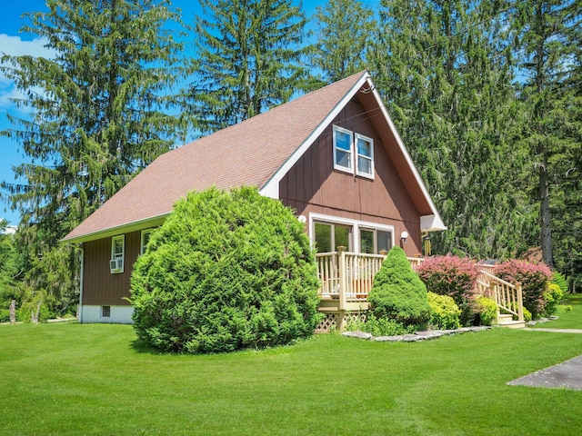75 Hartung Rd, Eldred, NY 12743 - view of front facade featuring a front yard, roof with shingles, and a deck