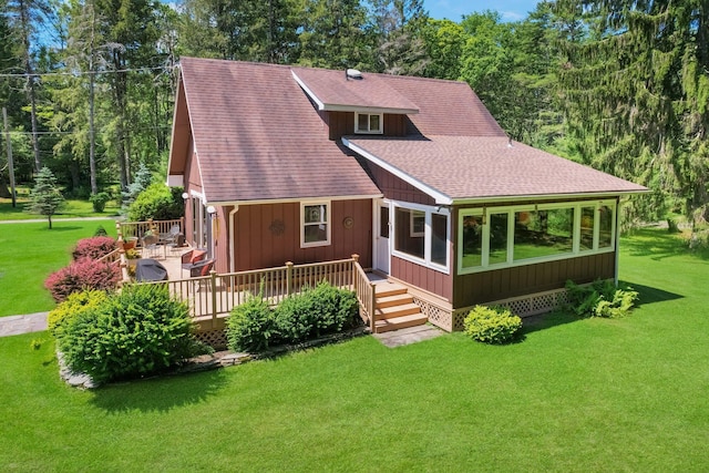 75 Hartung Rd, Eldred, NY 12743 - view of front facade with roof with shingles, a front yard, and a deck