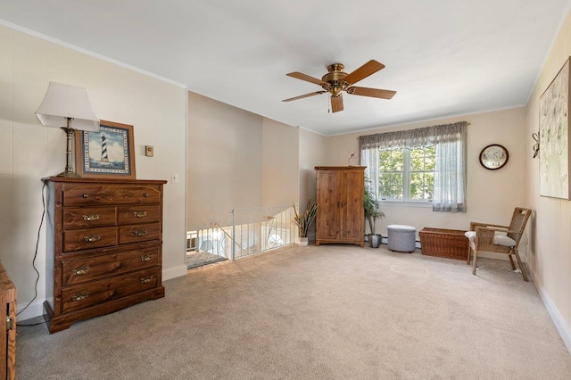 7 Mildred Ct, Nesconset, NY 11767 - living area with ceiling fan, carpet, and ornamental molding