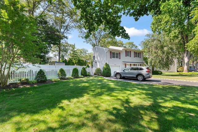 7 Mildred Ct, Nesconset, NY 11767 - view of yard featuring driveway and a garage