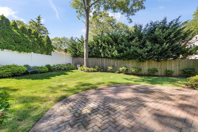 7 Mildred Ct, Nesconset, NY 11767 - fenced backyard with a patio