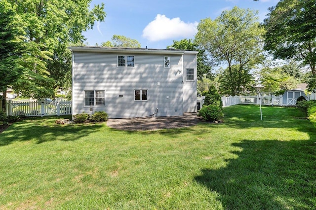 7 Mildred Ct, Nesconset, NY 11767 - back of house with a storage shed and a fenced backyard