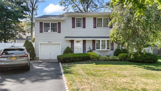 7 Mildred Ct, Nesconset, NY 11767 - view of front of house with driveway and an attached garage