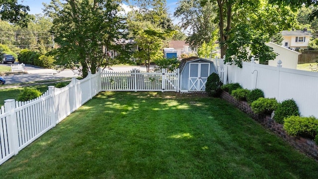 7 Mildred Ct, Nesconset, NY 11767 - fenced backyard with a storage unit