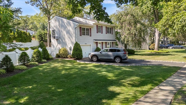 7 Mildred Ct, Nesconset, NY 11767 - traditional-style home featuring driveway and a garage