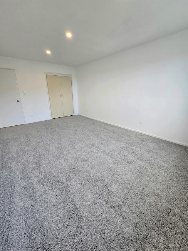 89-40 151st Ave Unit 5F, Howard Beach, NY 11414 - unfurnished bedroom featuring recessed lighting, a closet, and carpet floors