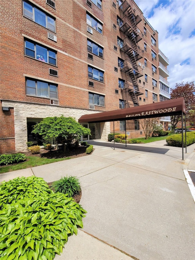 89-40 151st Ave Unit 5F, Howard Beach, NY 11414 - view of apartment building / complex featuring covered parking