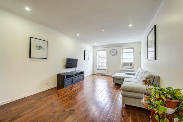 111-39 76th Rd Unit E2, Forest Hills, NY 11375 - living area with radiator heating unit, wood finished floors, cooling unit, and recessed lighting