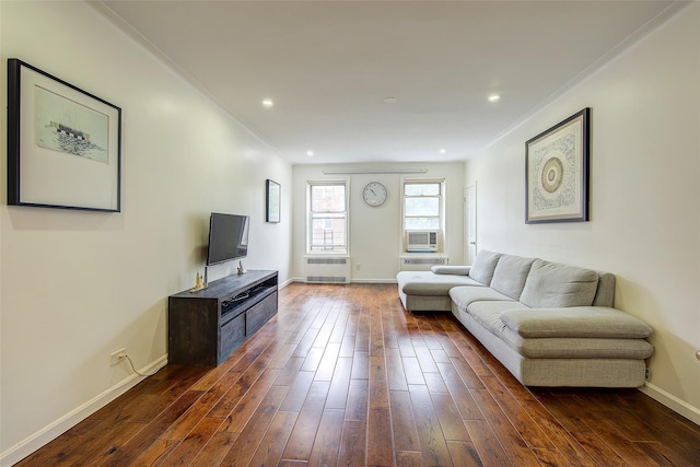 111-39 76th Rd Unit E2, Forest Hills, NY 11375 - living room with radiator heating unit, dark wood-style floors, crown molding, and recessed lighting