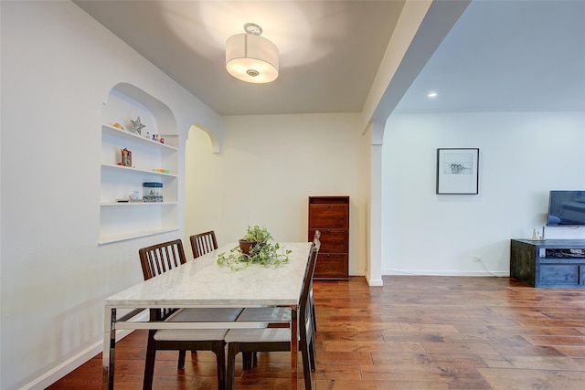 111-39 76th Rd Unit E2, Forest Hills, NY 11375 - dining room featuring wood finished floors and built in features
