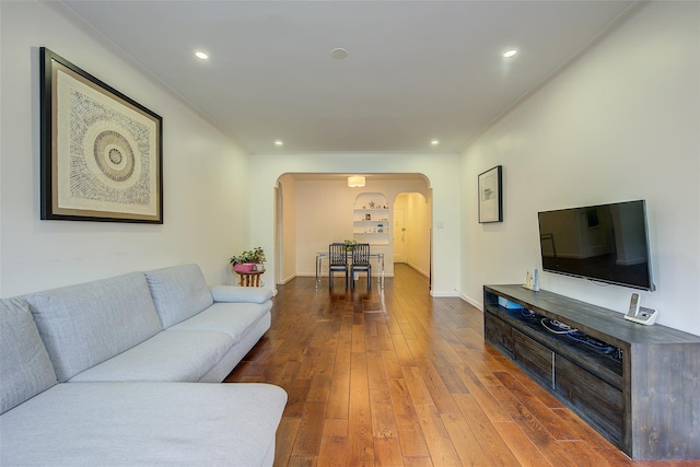 111-39 76th Rd Unit E2, Forest Hills, NY 11375 - living room featuring arched walkways, hardwood / wood-style floors, and recessed lighting