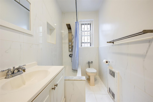 111-39 76th Rd Unit E2, Forest Hills, NY 11375 - full bath featuring radiator heating unit, tile walls, vanity, shower / tub combo, and marble finish floors