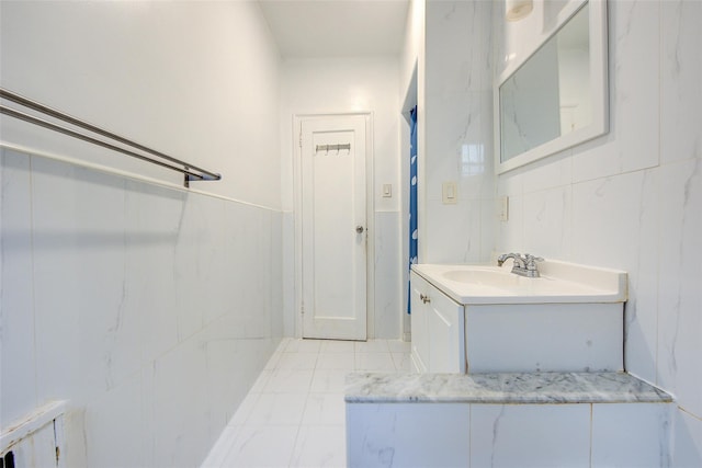 111-39 76th Rd Unit E2, Forest Hills, NY 11375 - bathroom featuring vanity and tile walls