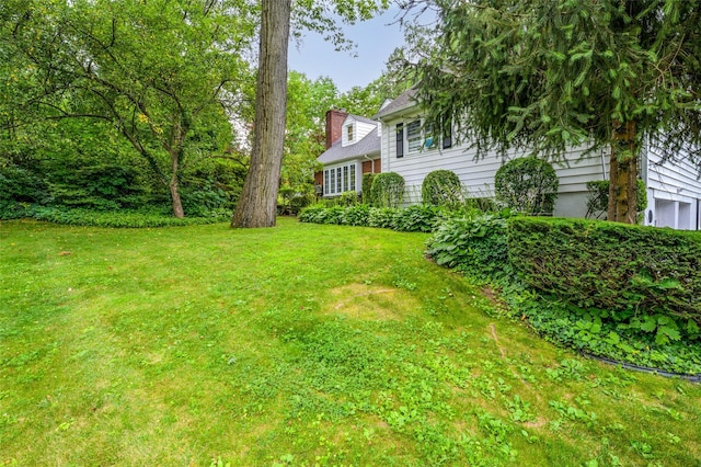 9 Martin Rd, Yonkers, NY 10701 - view of green lawn featuring a garage