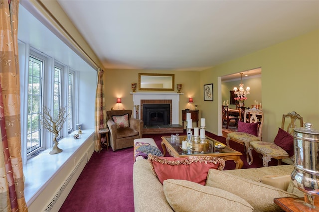 9 Martin Rd, Yonkers, NY 10701 - living area featuring dark colored carpet, a chandelier, and a baseboard heating unit