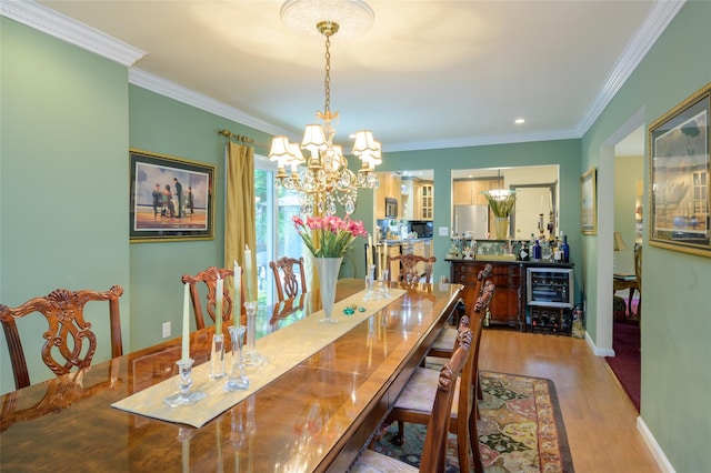 9 Martin Rd, Yonkers, NY 10701 - dining area with a chandelier, wood finished floors, and crown molding