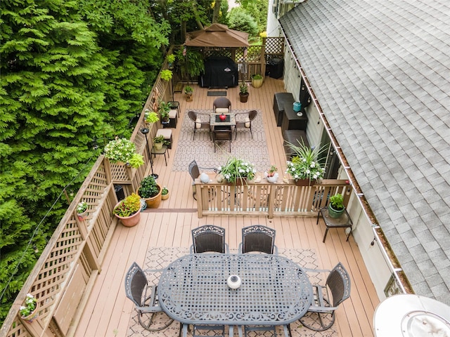 9 Martin Rd, Yonkers, NY 10701 - wooden terrace with outdoor dining space and a grill