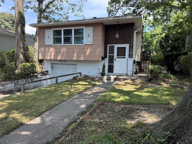 35 E Walnut St, Massapequa, NY 11758 - bi-level home featuring a garage, a front yard, and brick siding