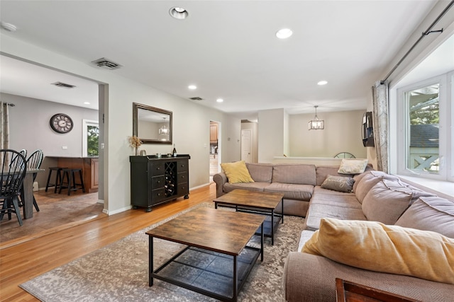 27A Claremont Ln, Suffern, NY 10901 - living area featuring light wood finished floors, healthy amount of natural light, and recessed lighting
