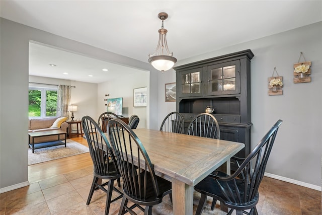 27A Claremont Ln, Suffern, NY 10901 - dining area with recessed lighting and light tile patterned floors
