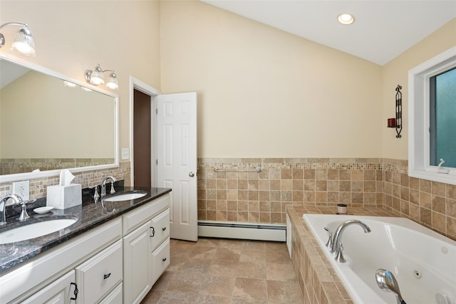 27A Claremont Ln, Suffern, NY 10901 - full bath featuring a baseboard radiator, double vanity, a tub with jets, and recessed lighting