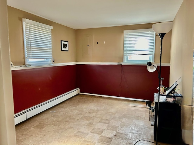 27A Claremont Ln, Suffern, NY 10901 - spare room featuring a baseboard radiator and electric panel