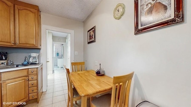 77-52 76th St, Glendale, NY 11385 - dining space with light tile patterned floors