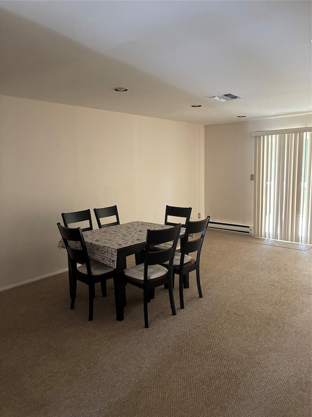 2355 Pershing Blvd Unit 707, Baldwin, NY 11510 - carpeted dining room featuring a baseboard radiator