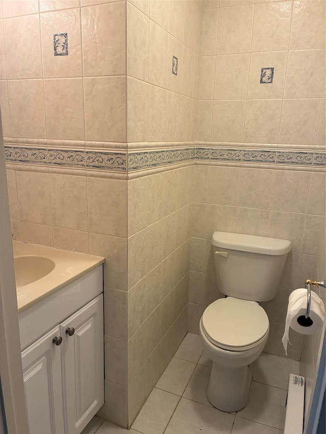 2355 Pershing Blvd Unit 707, Baldwin, NY 11510 - bathroom featuring vanity, tile walls, and tile patterned floors