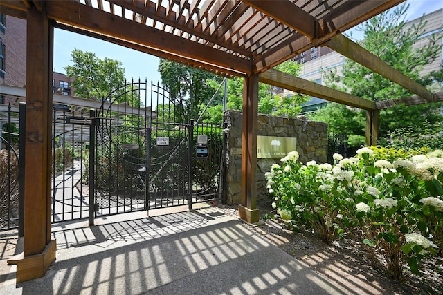 87-10 51st Ave Unit 6W, Elmhurst, NY 11373 - view of patio / terrace featuring a gate and a pergola