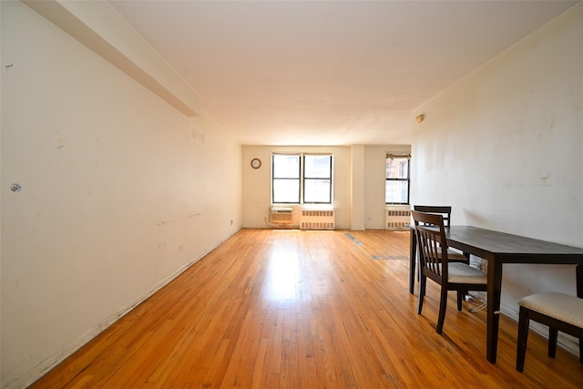 87-10 51st Ave Unit 6W, Elmhurst, NY 11373 - empty room featuring light wood finished floors and radiator