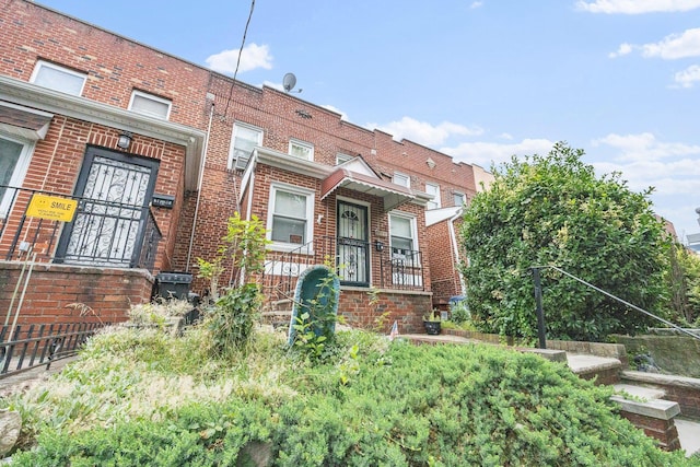 2117 38th St, Astoria, NY 11105 - townhome / multi-family property featuring brick siding