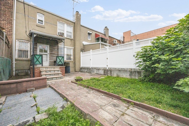 2117 38th St, Astoria, NY 11105 - fenced backyard with entry steps