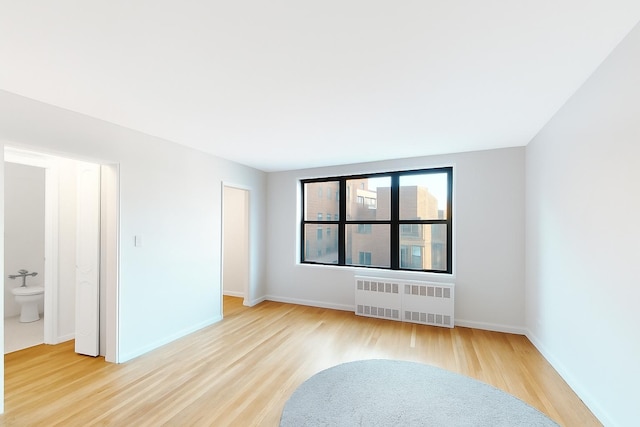 1165 E 53rd Unit Z7Z, Brooklyn, NY 11234 - spare room with radiator and wood finished floors