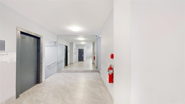 1165 E 53rd Unit Z7Z, Brooklyn, NY 11234 - hall featuring elevator and light tile patterned flooring
