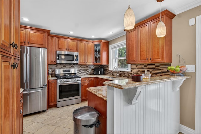 1004 Balcom Ave, Bronx, NY 10465 - kitchen featuring appliances with stainless steel finishes, a peninsula, brown cabinetry, backsplash, and ornamental molding