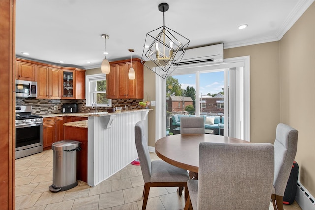 1004 Balcom Ave, Bronx, NY 10465 - kitchen featuring appliances with stainless steel finishes, a baseboard heating unit, backsplash, brown cabinetry, and ornamental molding