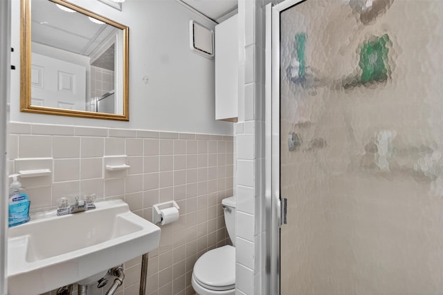 1004 Balcom Ave, Bronx, NY 10465 - full bath featuring a shower stall, tile walls, and a wainscoted wall